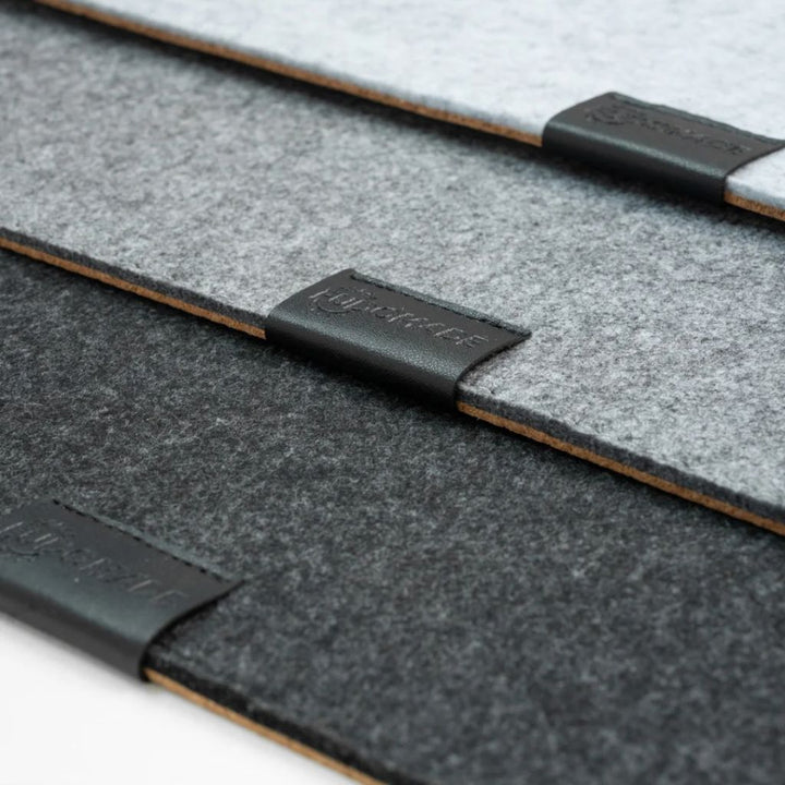 SootheForLife felt cork desk mat layered stack with strap showing portable storage design