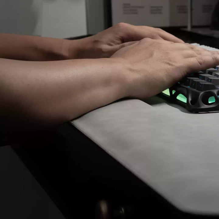 SootheForLife magnetic wrist rest desk mat typing on grey surface for ergonomic workspace