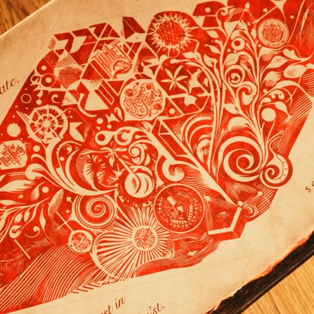 SootheForLife Shakespeare manuscript desk mat red medallion detail for design-focused users